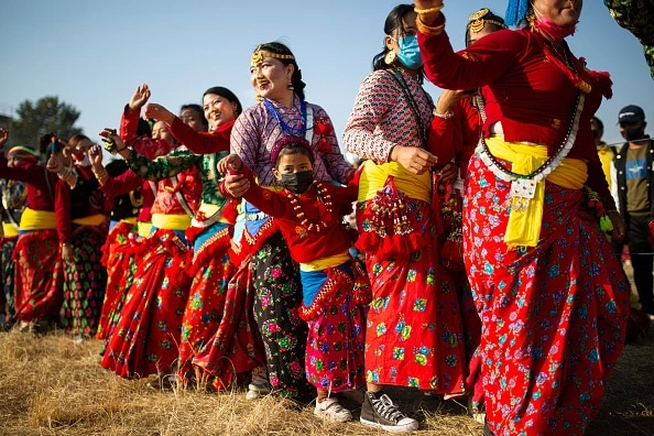 People performing a traditional Nepali folk dance.
